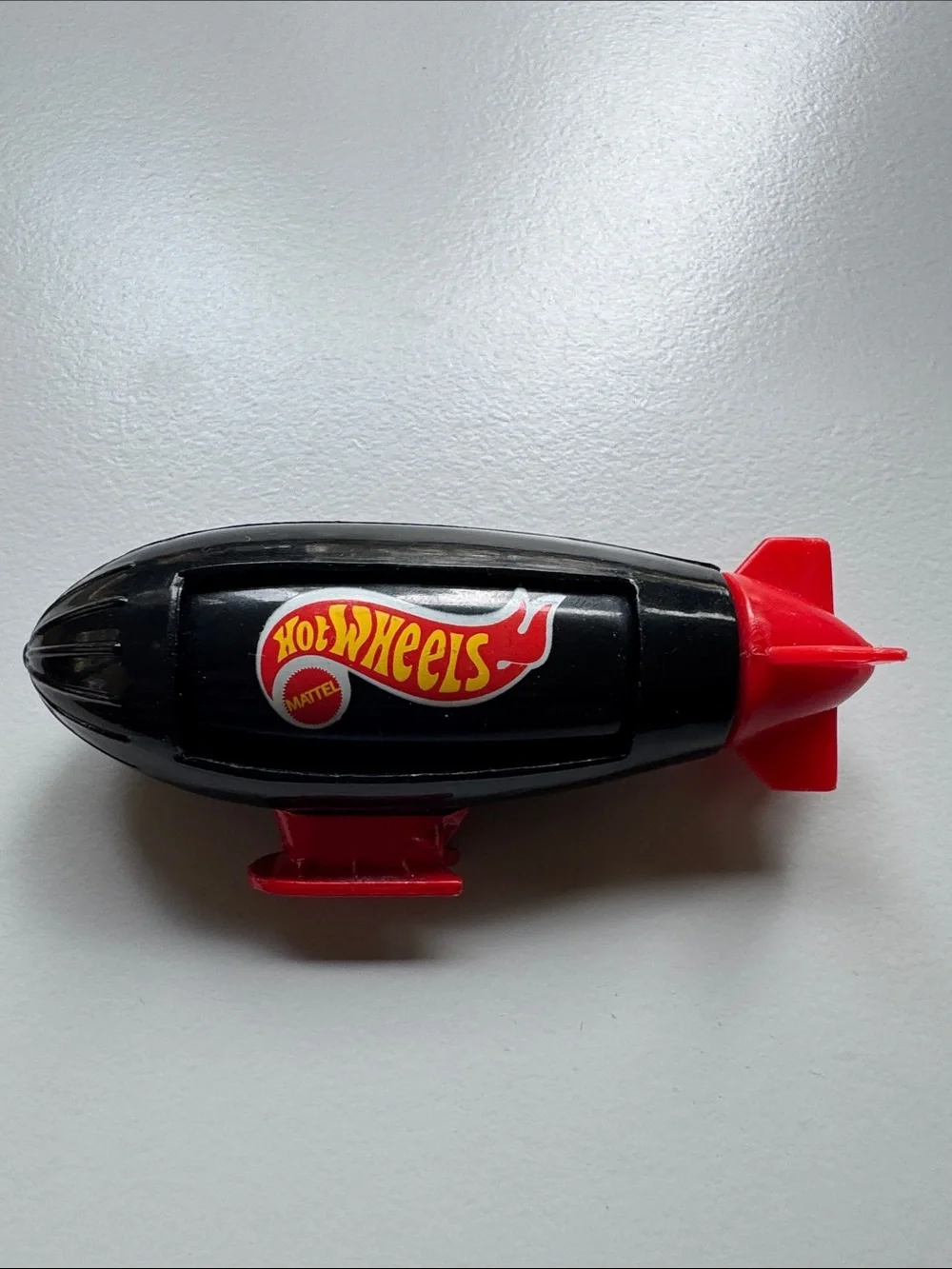 Black & Red Blimp Toy - Leading The Way
